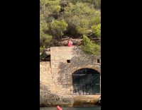 Woman pink bikini sexy dance at beach