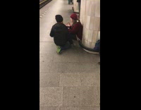 woman red sweater black white rat on back