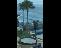 White cover up lady dances wood bridge