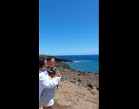 Baby vomits to mouth of the woman