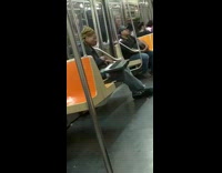Man plays keyboard piano on subway train