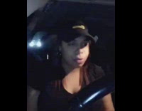 Woman sings Ariana Grande song in car while driving and gets in character