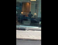 Actor burglar robs a bank with rifle gun and tells workers to put their hands up in movie shoot