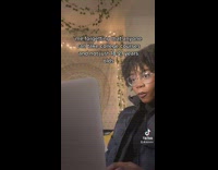 Girl on laptop reacts damn 