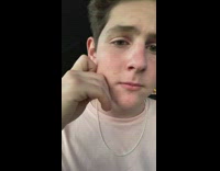 Filmer pinch and pulls skin from cheeks face