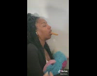 Woman puts cookies in friends mouth during sleep