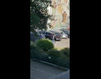 Four girls selfie parking lot mural bush