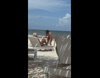 Woman red bikini photographer adjust friends pose