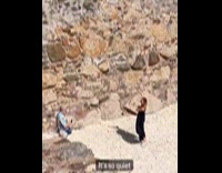 Woman black dress tiktok dance at beach