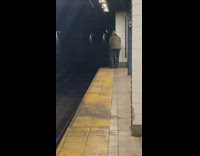 Man peeing into subway tracks has rat run up leg