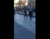 Woman in yoga outfit hand stand at the park