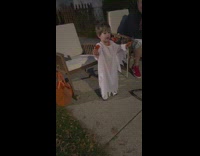  Little ghost kid offers candy 