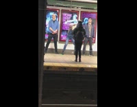 girl dances crazy between guys