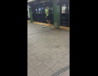 Guy walk barefoot along subway alone at new york 