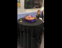 Collab Subway Creatures - Woman candy on table costume inside train