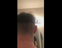 Straight mushroom haircut black shirt guy