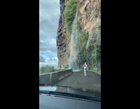 Collab IITW - Photographers Take Pictures of Man Walk Pass Waterfall
