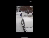Man taking trash out slips on driveway