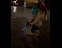 Girl dress as mermaid carried by pirate