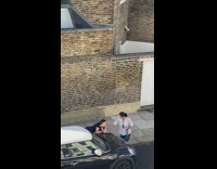 Girl black car mom fix hair street