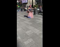 Street performer guitar around neck long skirt 