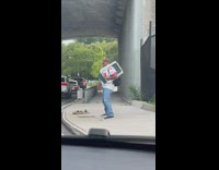 Guy humps air on sidewalk 