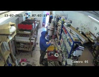 Guy holding can makes blue foam explode everywhere 