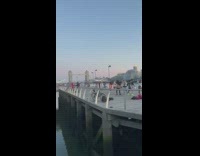 Group dance pier bridge bike green shoes