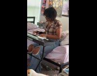 Girl playing piano surprised recording 