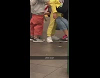 Mom lets her son pee in water bottle at subway station