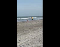 Girl bend pose show butt beach waves