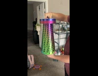 Collab Clips MPUGC2 - Woman demonstrating 3d printed collapsible chair 