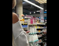 Collab AnimalIG - Orange butterfly on the hand of the woman in the supermarket