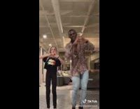 Guy booty bumps little girl and sends her flying out out of frame tik tok song