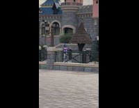 Man pointy blue hat dance disneyland castle