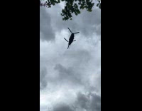 Chinook helicopter flies above the filmer filming