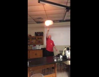 Science teacher lights bubble cloud 