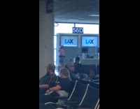 Person pink crop top tiktok at airport