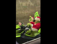 How the grinch waves to strangers on christmas