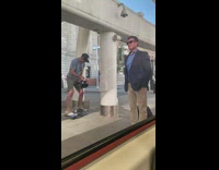 Man videographer rides One wheel board video shoot