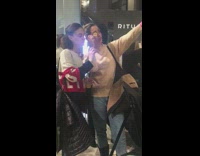 Girls take selfie yellow sticker