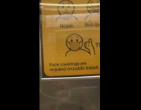 Blue shirt guy face mask under chin 