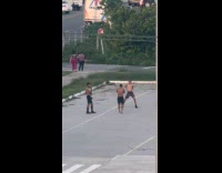 Three shirtless men tiktok shoot parking lot