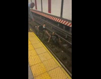 Stranger Helps Man Subway Tracks