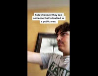 Guy grey shirt camera moving around pointing