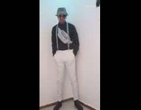 Guy holding toy gun changes clothes outfit 