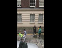 Six kids film music video in alley