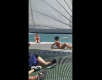 Mother red bikini boat kid life jacket