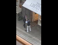 Collab IITW - Man suit with coffee talks beside store