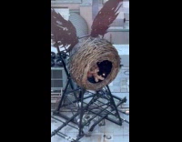 Collab WINY - Cursed child sculpture displayed above Lyric Theatre